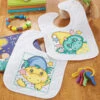 Baby By Herrschners Sleepy Dragons Baby Bibs Stamped Cross-Stitch Kit -Prym Clover Shop 050602 18480.1693401116